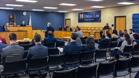 An attorney presents his oral argument in UMass Law's Francis J. Larkin Moot Court Room