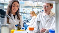 Microbiology graduate student, Yousra Bendarkawi MS '24, in the lab with Professor Mark Silby