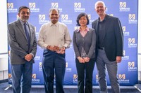 Dr. Satyanarayana Parayitam and Dr. Liudong Xing pictured after receiving the UMassD MAX Award, joined by Dr. Ramprasad Balasubramanian and Chancellor Mark Fuller.