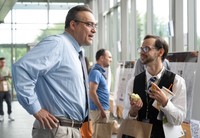 Prof. Paul Gendron was talking to a graduate student during the lunch break.