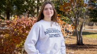 Portrait of Melanie Veilleux '24: Graphic Design (major)