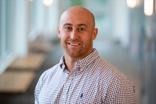 Head shot photo of alum