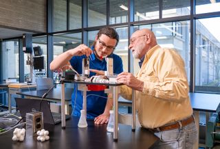 Mechanical engineering student, Nicholas Carvalho '23, in the lab with Professional Technician, Don Foster