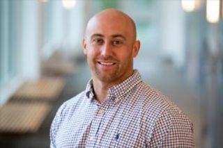 Head shot photo of alum