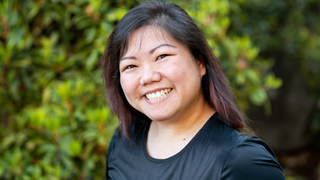 Headshot photo of Rita Wang