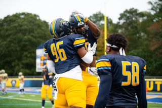 Football players celebrate