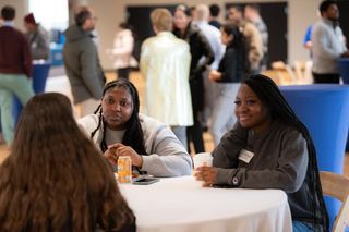 Students mingling with alumni