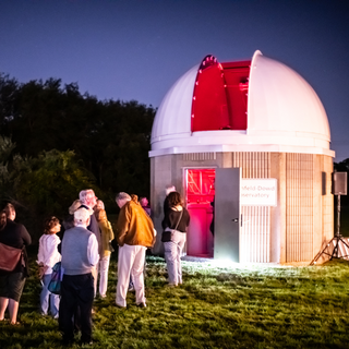 People line up outside the observatory