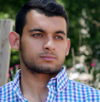 Professional headshot of Imad