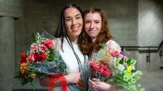 Holding flowers after Pinning Ceremony