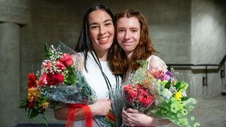 Holding flowers after Pinning Ceremony