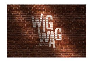 Wig Wag Interior Signage, 2021, paint on exposed brick, 3 x 3 feet