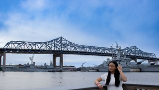 Guadalupe Garcia Carrillo headshot in front of the Braga Bridge