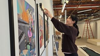 Joi installing work in gallery