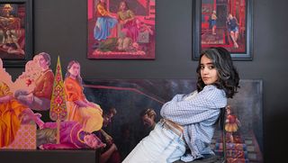 Sarah Valinezhad with artwork