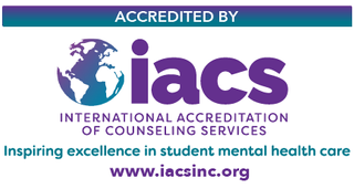 Logo with the text: Accredited by the international accreditation of counseling services