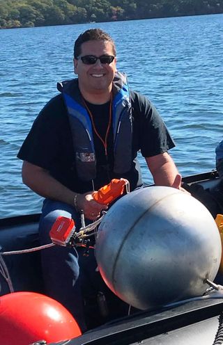 Marcos Sastre-Cordova on a boat on the water