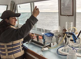 Christian Petitpas sampling Buzzards Bay water