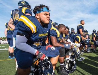 Corsairs football players with helmets