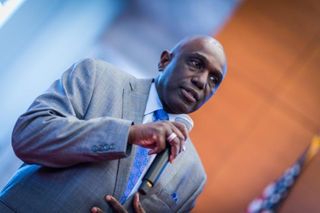 Chancellor Robert E. Johnson, PhD with microphone