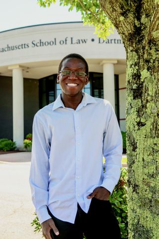 Phillip Rutahweire outside UMass Law