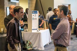 Dr. Lance Fiondella, right, and student - College of Engineering senior design capstone project in May of this year.