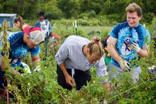 Students volunteering on farm