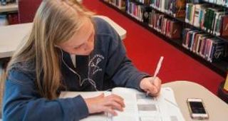 Student in library
