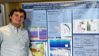 Juan Gutierrez Bravo with IMS poster