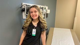 Chelsee Teotonio poses at her job at Hawthorn Medical Center