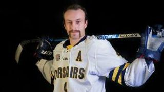 Cade Hanley '24, poses at the hockey team's media shoot before the 2022-23 season.