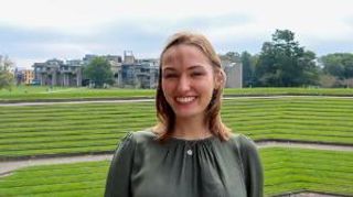 Kamryn Kobel in front of the amphitheater.