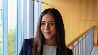 Crime and justice studies/philosophy student Aaliyah Encarnacion smiling