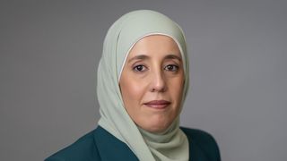 Headshot of Fatima Alzyoud '22 in front of a gray background
