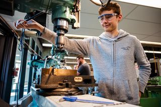 Mechanical engineering major James Bonnell working in the machine lab