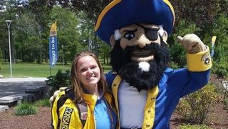 Mollie Madigan posing with Arnie