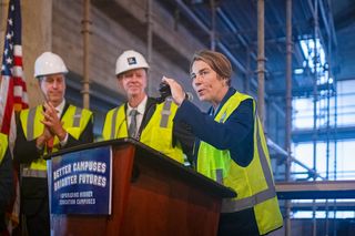 Gov. Healy speaking at podium with Chancellor Fuller at the LARTS renovation