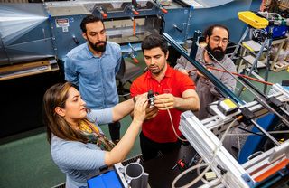 Students conducting research in the Fluid-Structure Interactions Research Laboratory