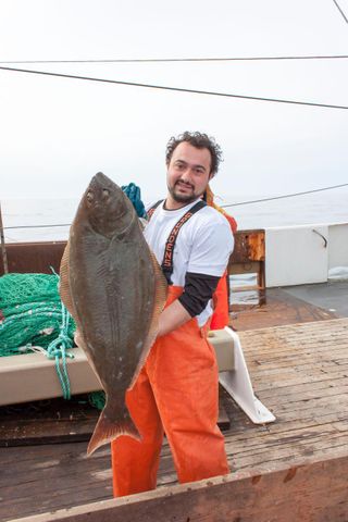 Dave Bethoney holding up a large fish