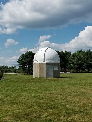 Observatory with blue sky and clouds