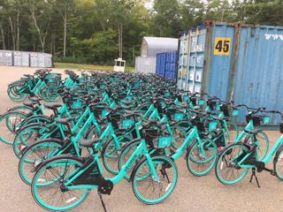 Bikes being unloaded on campus