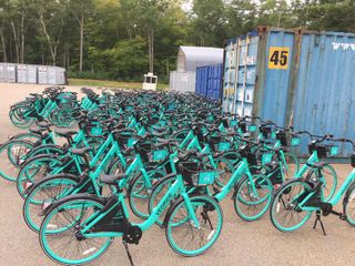 Bikes being unloaded on campus