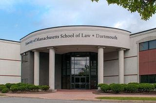 Daytime shot of law school building with the school name