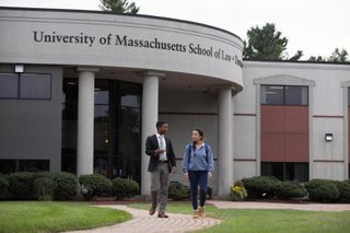 Students walking in front of law school