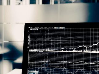 Laptop with data graphs