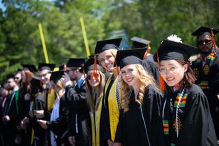 Students at graduation in regalia