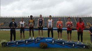 Student-athletes at Podium