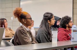 students in a classroom listening to a lecture