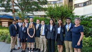 The UMassD DECA team pictured in Orlando