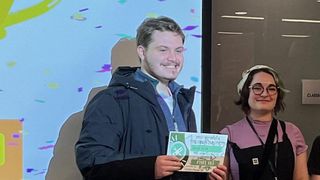 Jared Gula '24 accepts his award for 